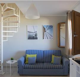 2 bedroom seaside apartments with shared pool, sleeps 4-5